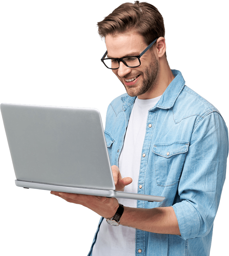 Man in blue shirt holding laptop